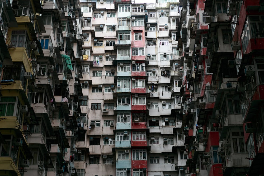 a very tall building with many windows and balconies