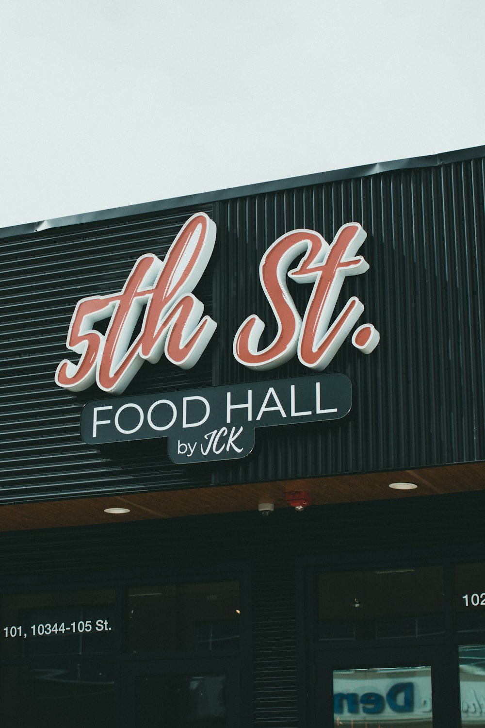 the front of a restaurant with a sign for the restaurant