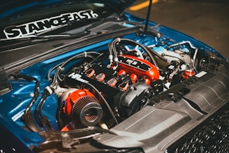 the engine compartment of a car with the hood open