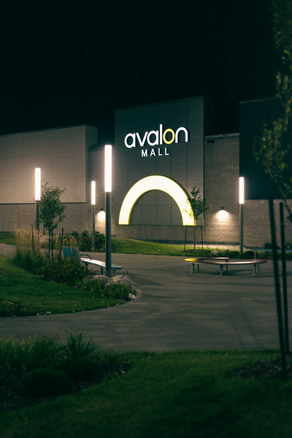 a building with a sign that says avalon mall