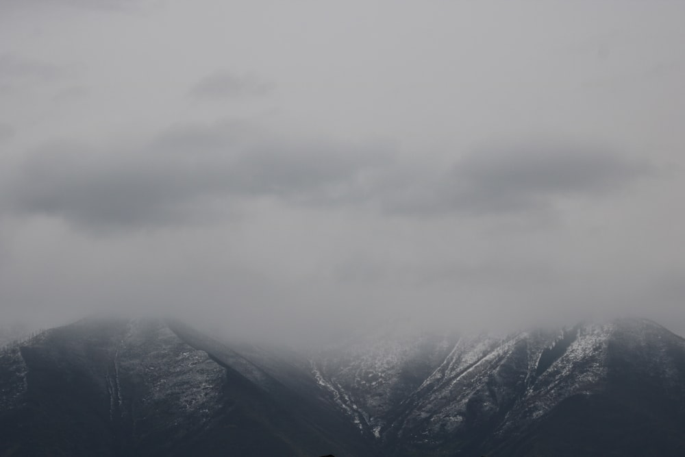 a view of a mountain range covered in snow