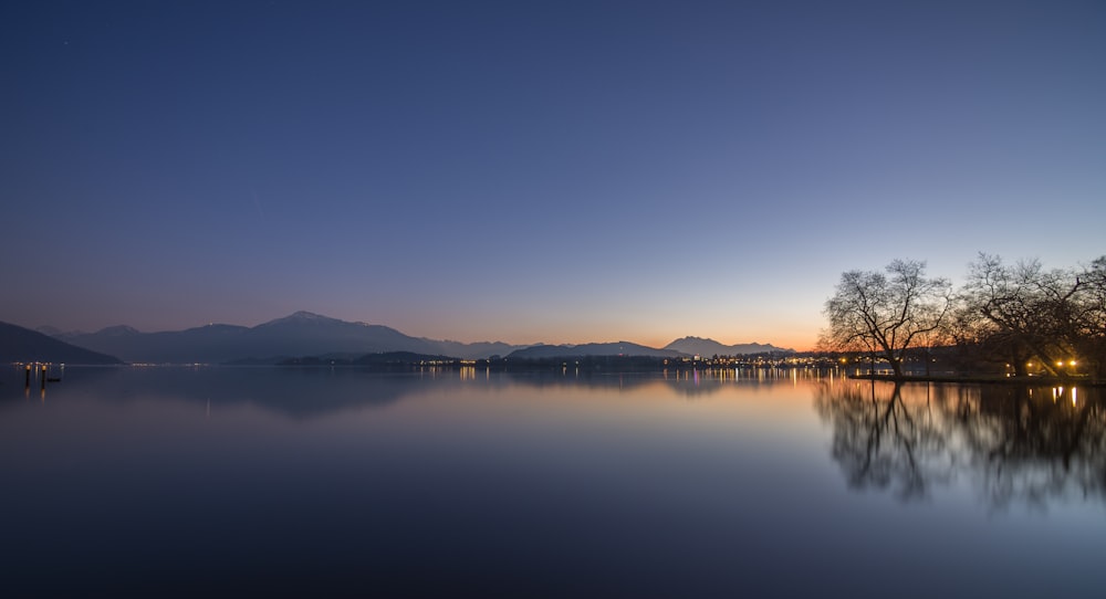 a large body of water surrounded by mountains