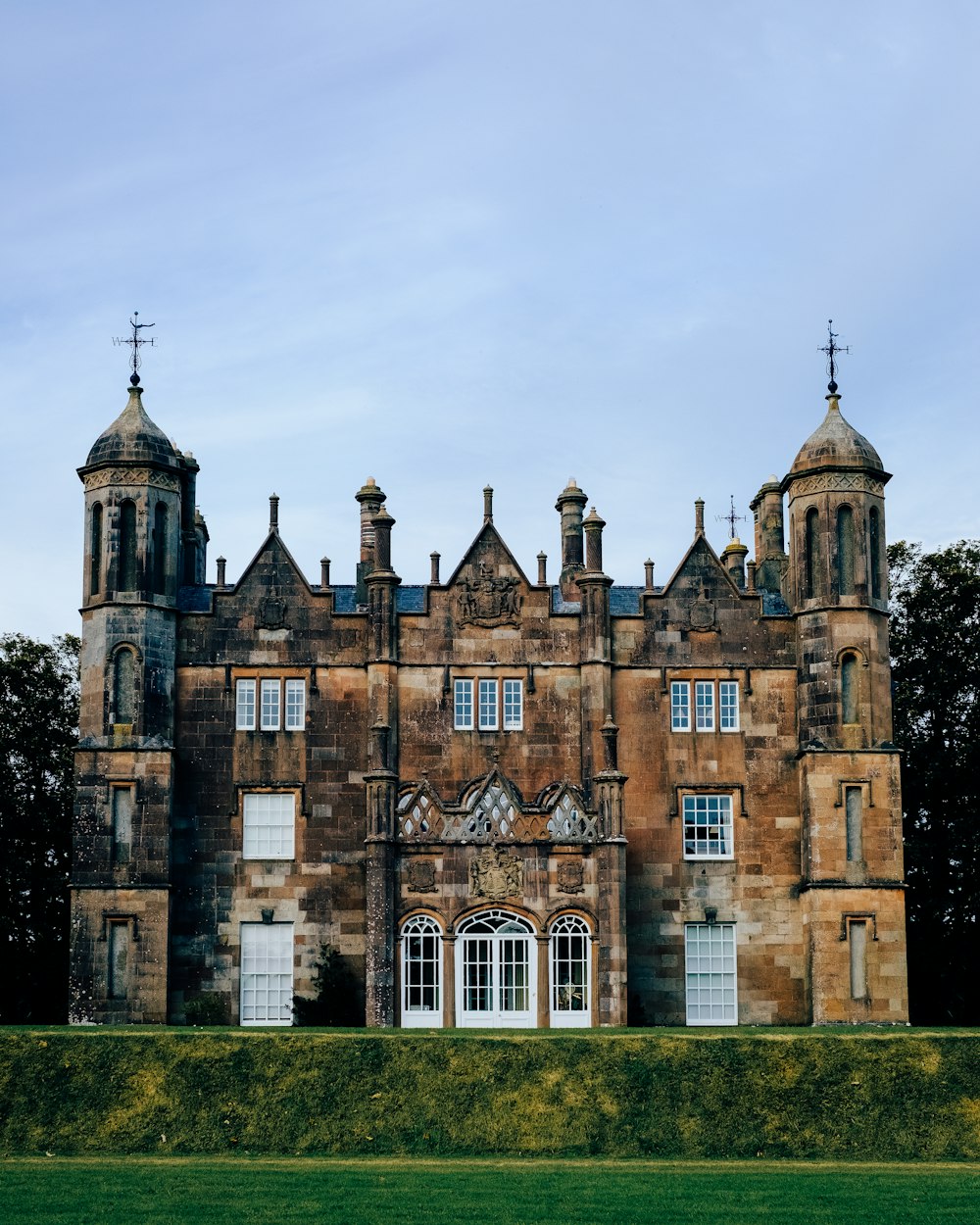 a large building with two towers on top of it