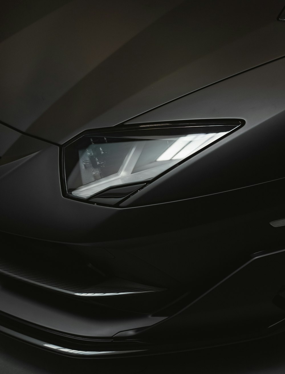 a close up of a black sports car