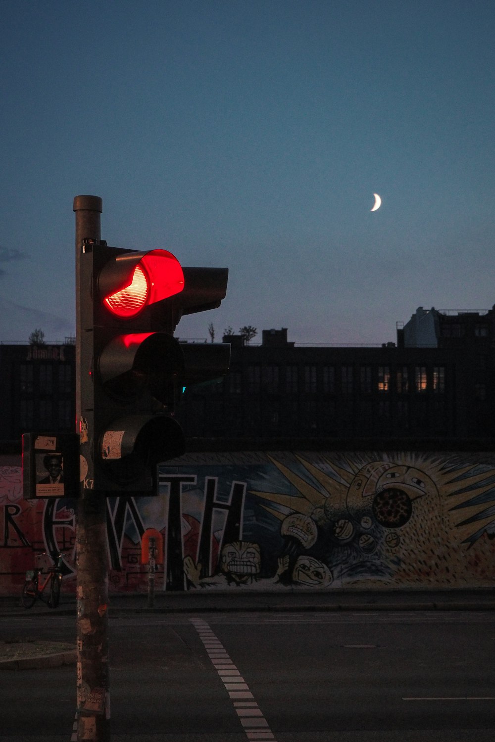 a traffic light sitting on the side of a road