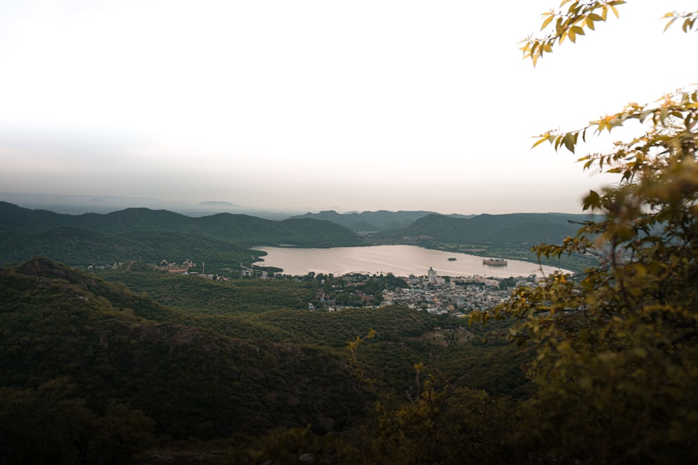 a view of a body of water surrounded by mountains