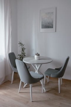 A stylish dining area with compact, elegant furniture fitting perfectly in a small room.