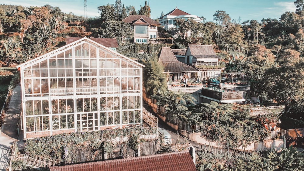 an aerial view of a house surrounded by trees