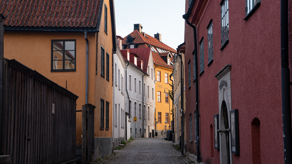 a narrow street with buildings on both sides