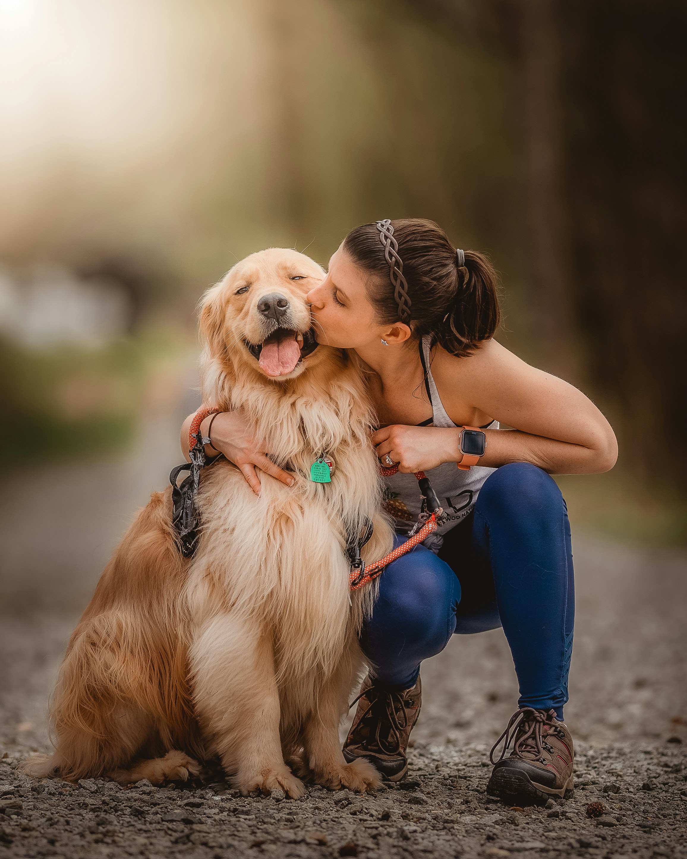 great photo recipe,how to photograph this is my beautiful wife kissing our golden retriever oakley. as you can see, this little boy is so happy in this moment. ; a woman kissing her dog on the cheek