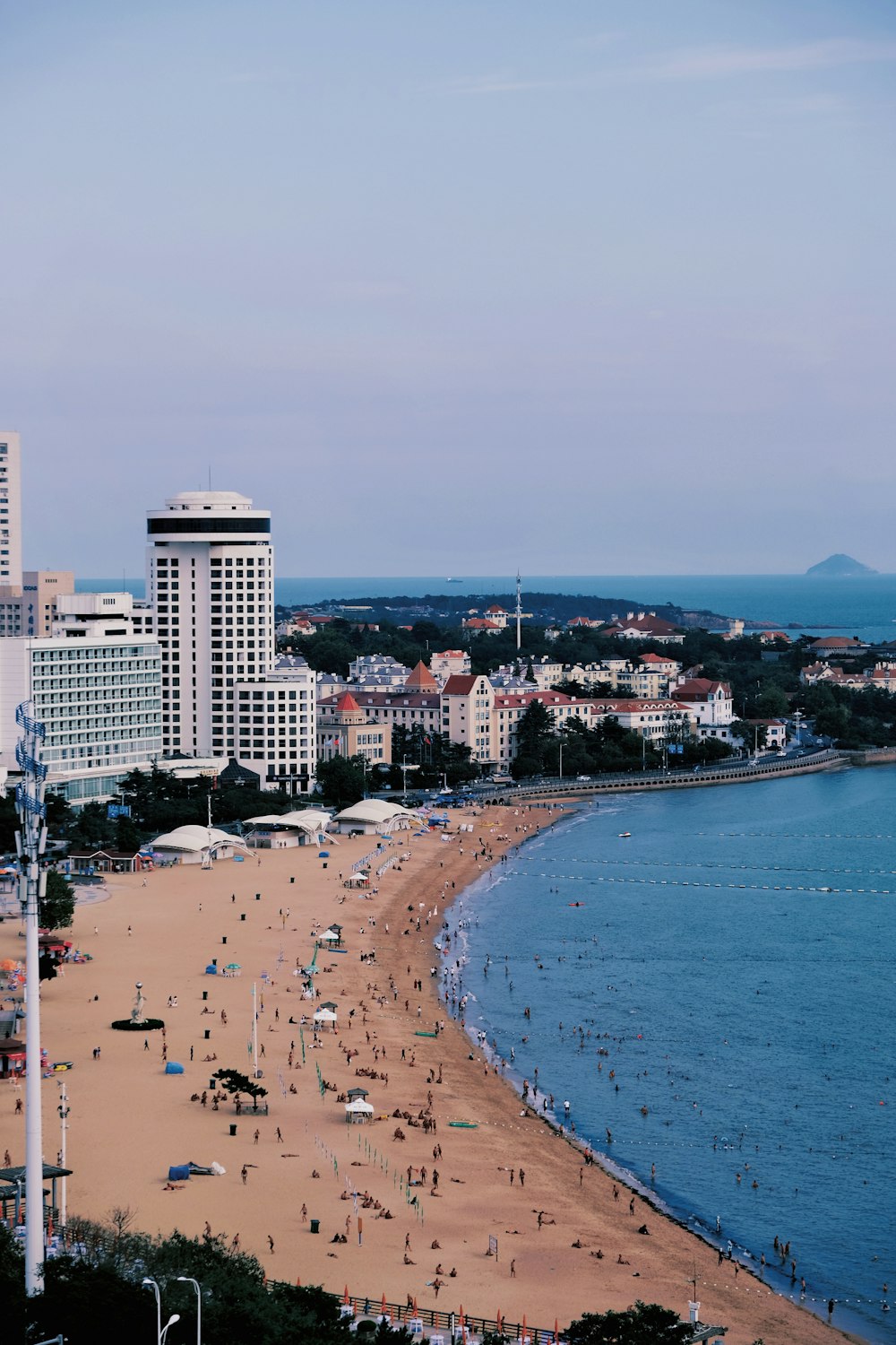 a beach with a lot of people on it