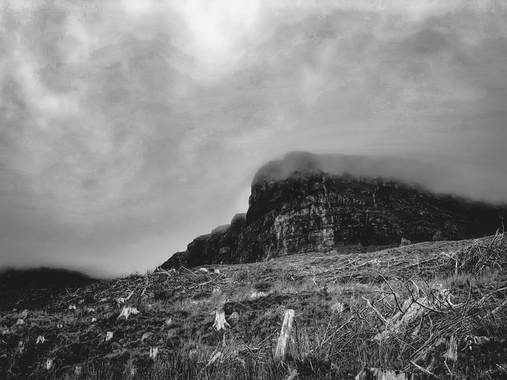 a black and white photo of a mountain