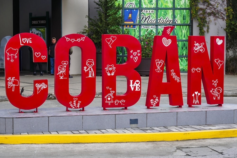 a large red sign that says coban on it