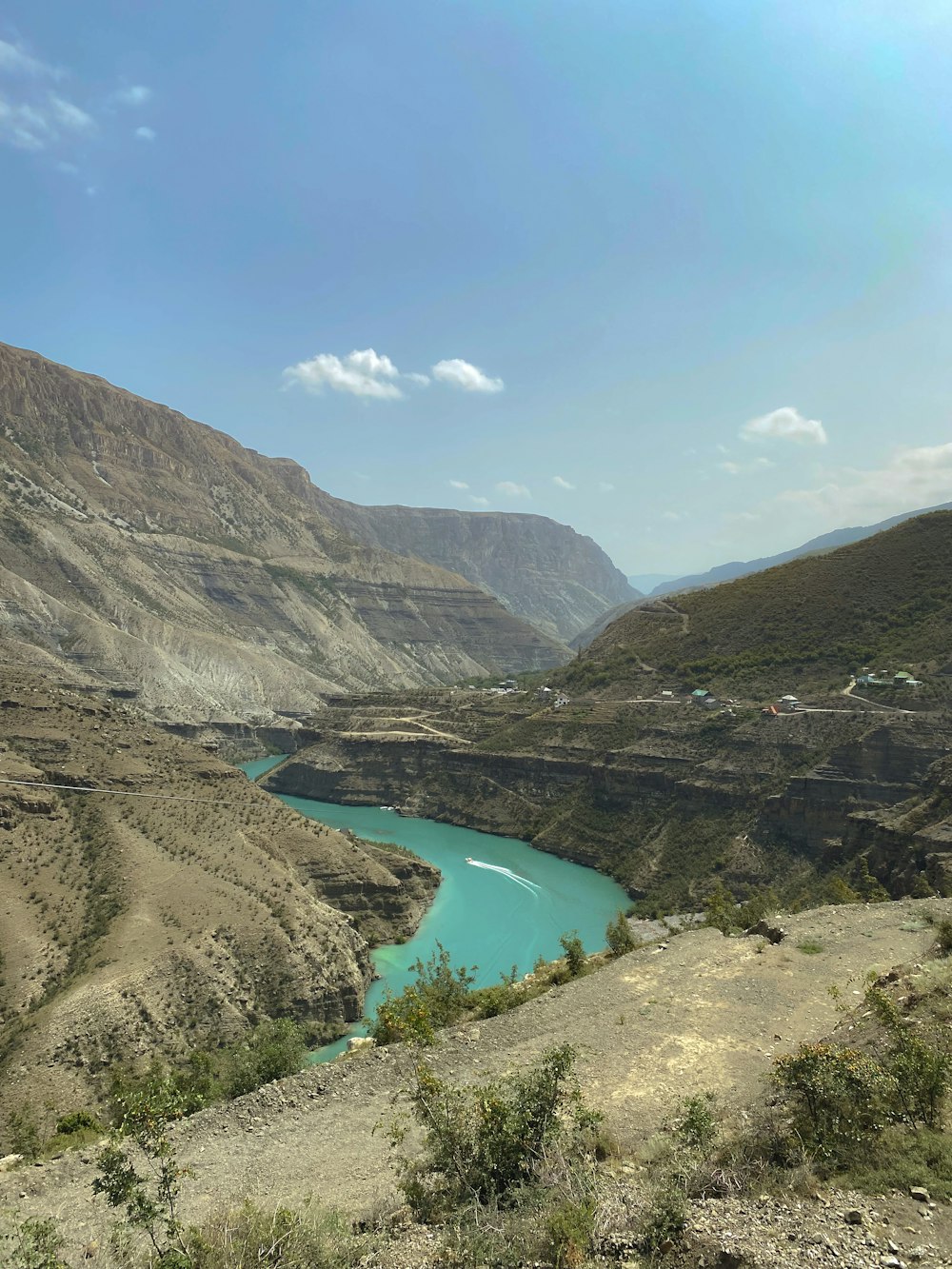 a river in the middle of a mountain range