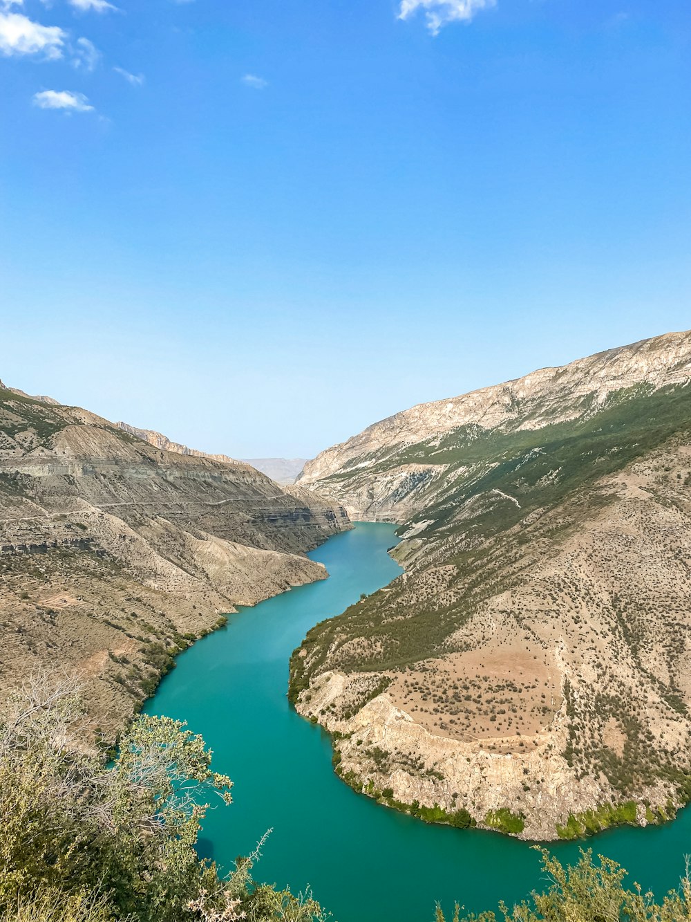 a large body of water surrounded by mountains