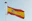 the spanish flag is flying high in the sky