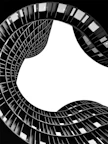 a black and white photo of a spiral shaped building