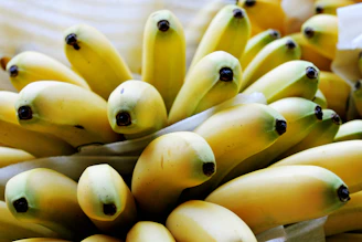 a bunch of bananas that are sitting on a table