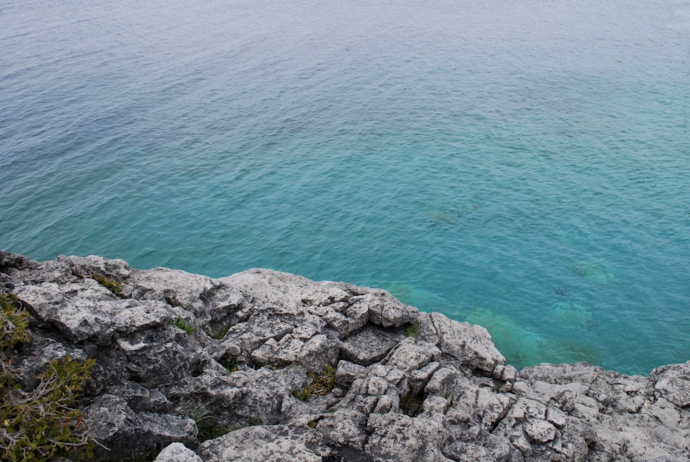 a view of a body of water from a cliff