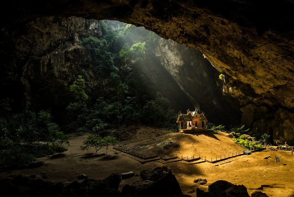 a group of people standing in a cave