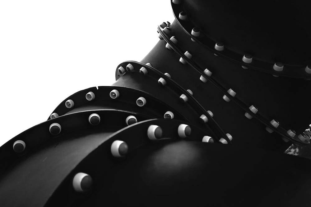 a black and white photo of a woman's torso