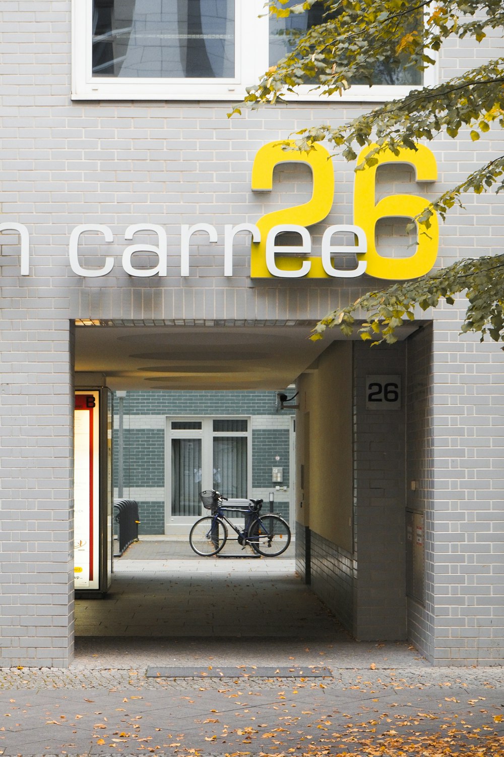 a bike is parked in the doorway of a building