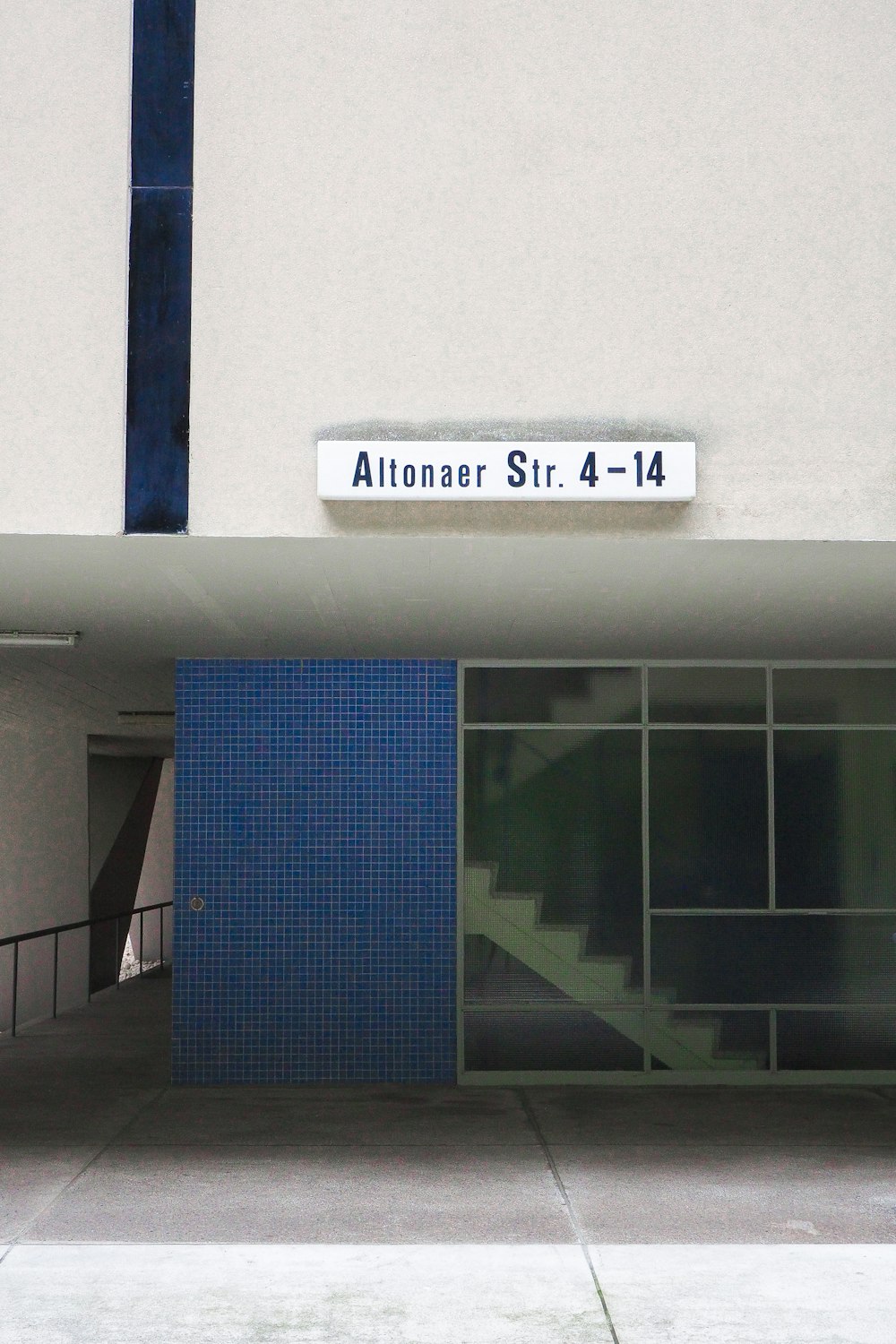 the entrance to a building with a blue door