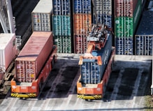cargo containers are stacked on top of each other