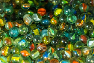 a close up of a bunch of glass marbles