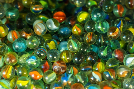 a close up of a bunch of glass marbles