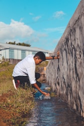 A student happily selecting a stream with guidance from an expert.