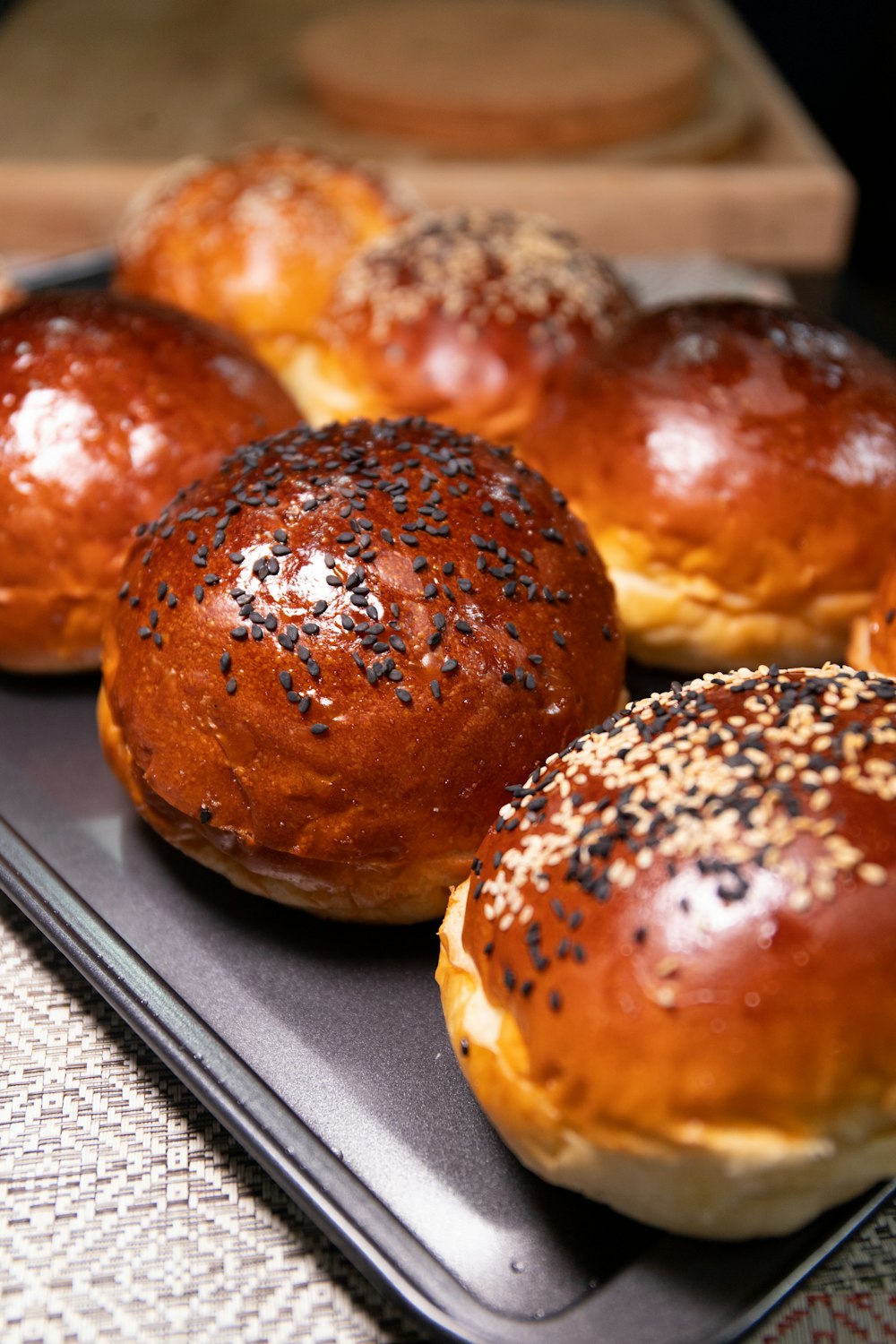 a close up of a tray of buns