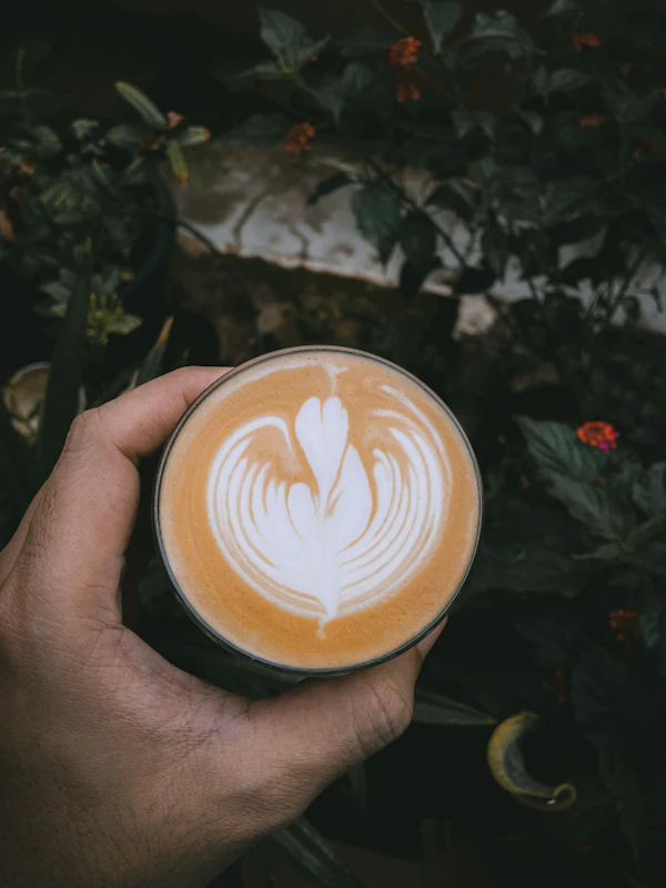 Taza de café en mano