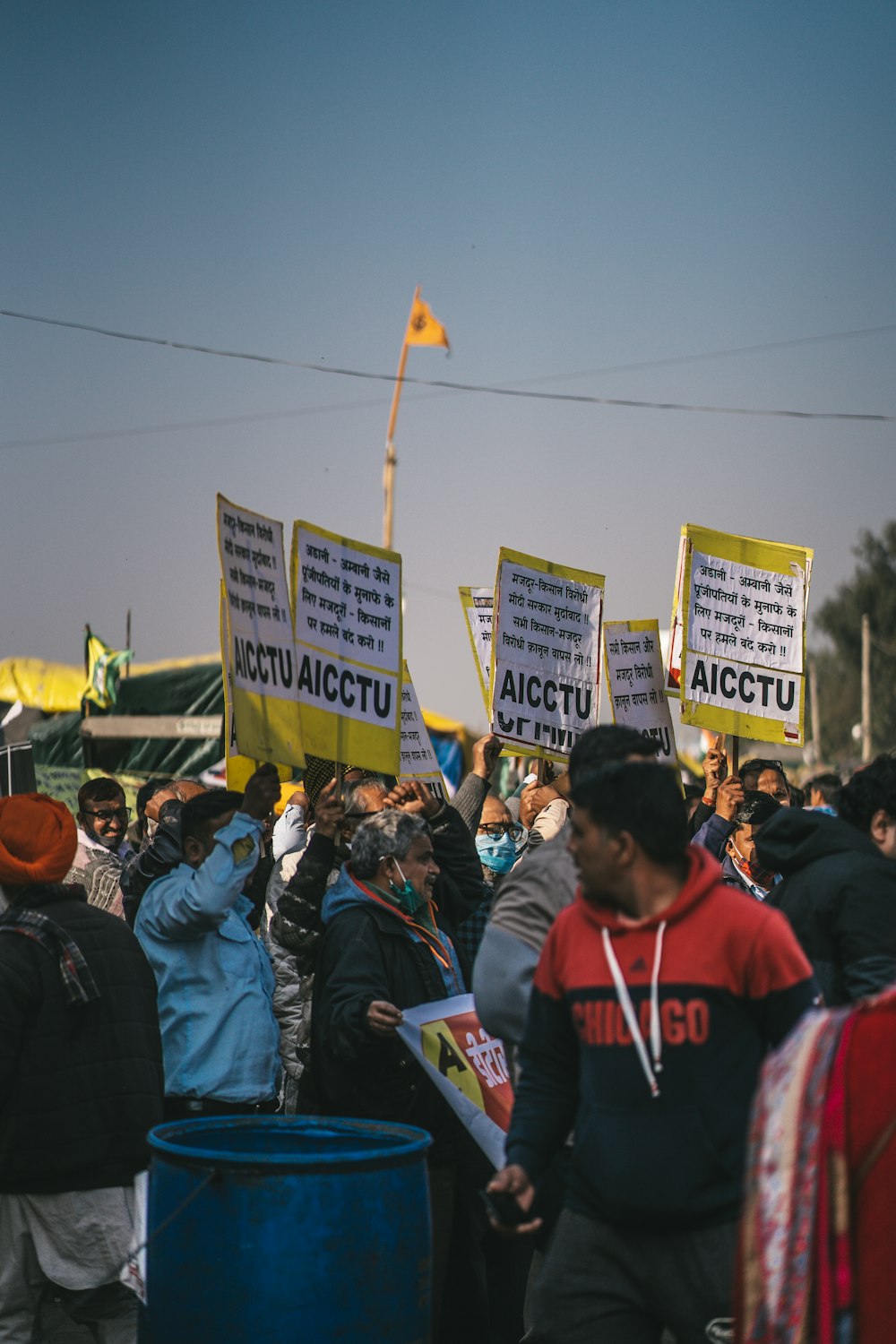 a large group of people holding up signs