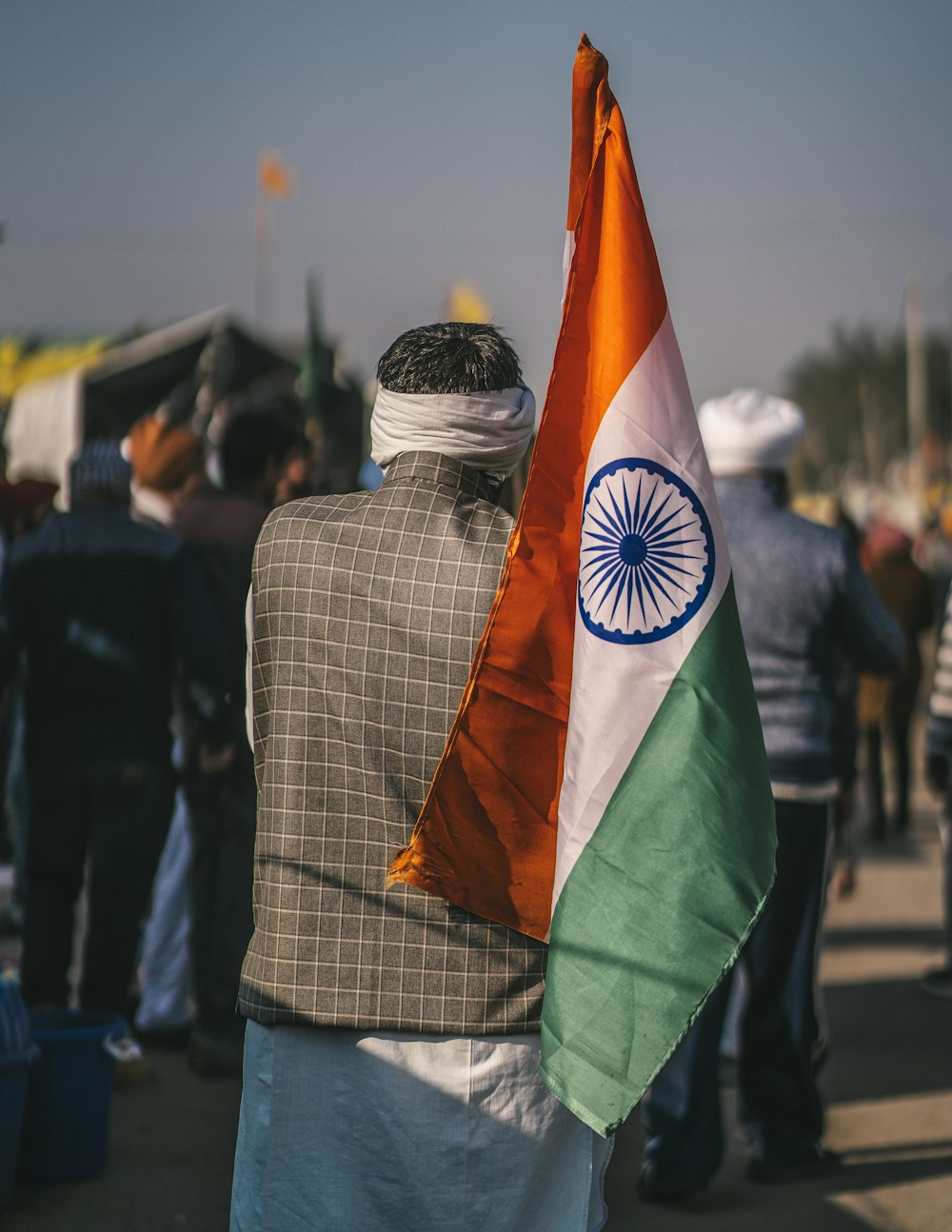 a man is holding a flag in his hand