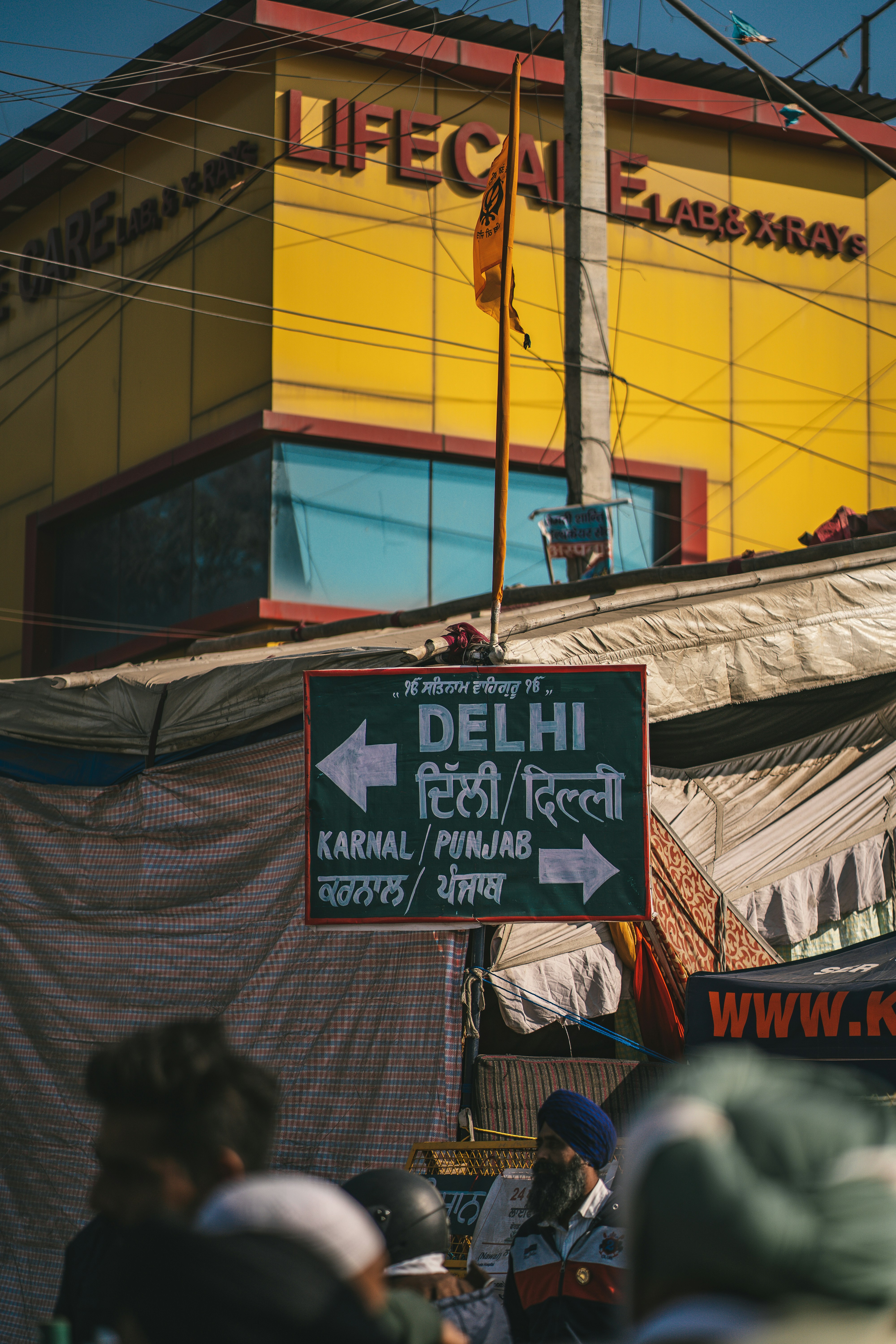 a group of people standing in front of a building