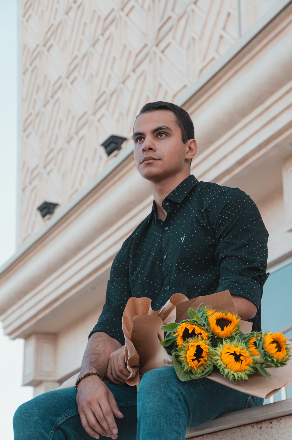 a person sitting in front of a window