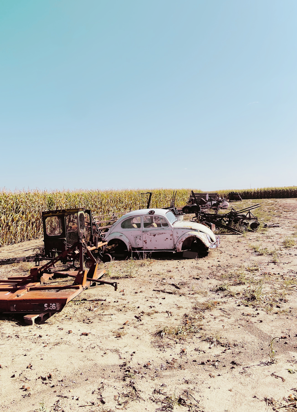 a car that is sitting in the dirt