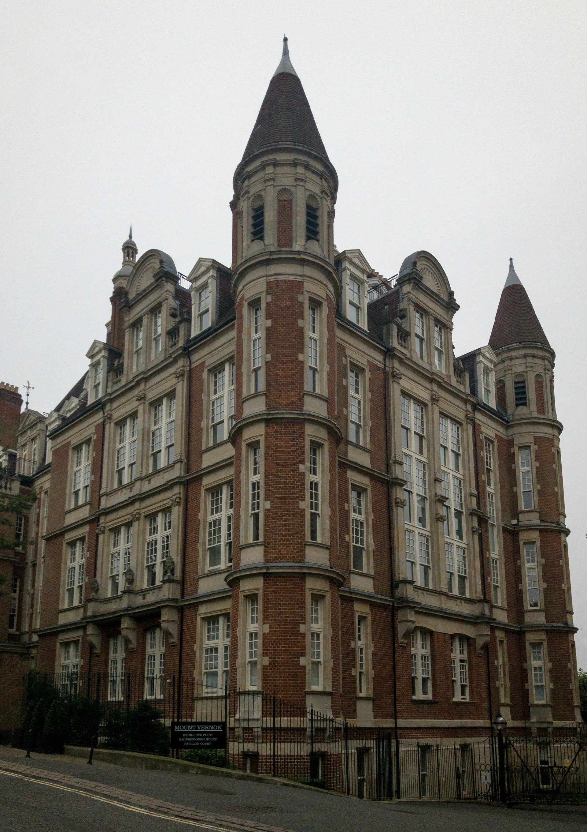 a large building with a clock on the top of it