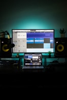 a computer monitor sitting on top of a desk