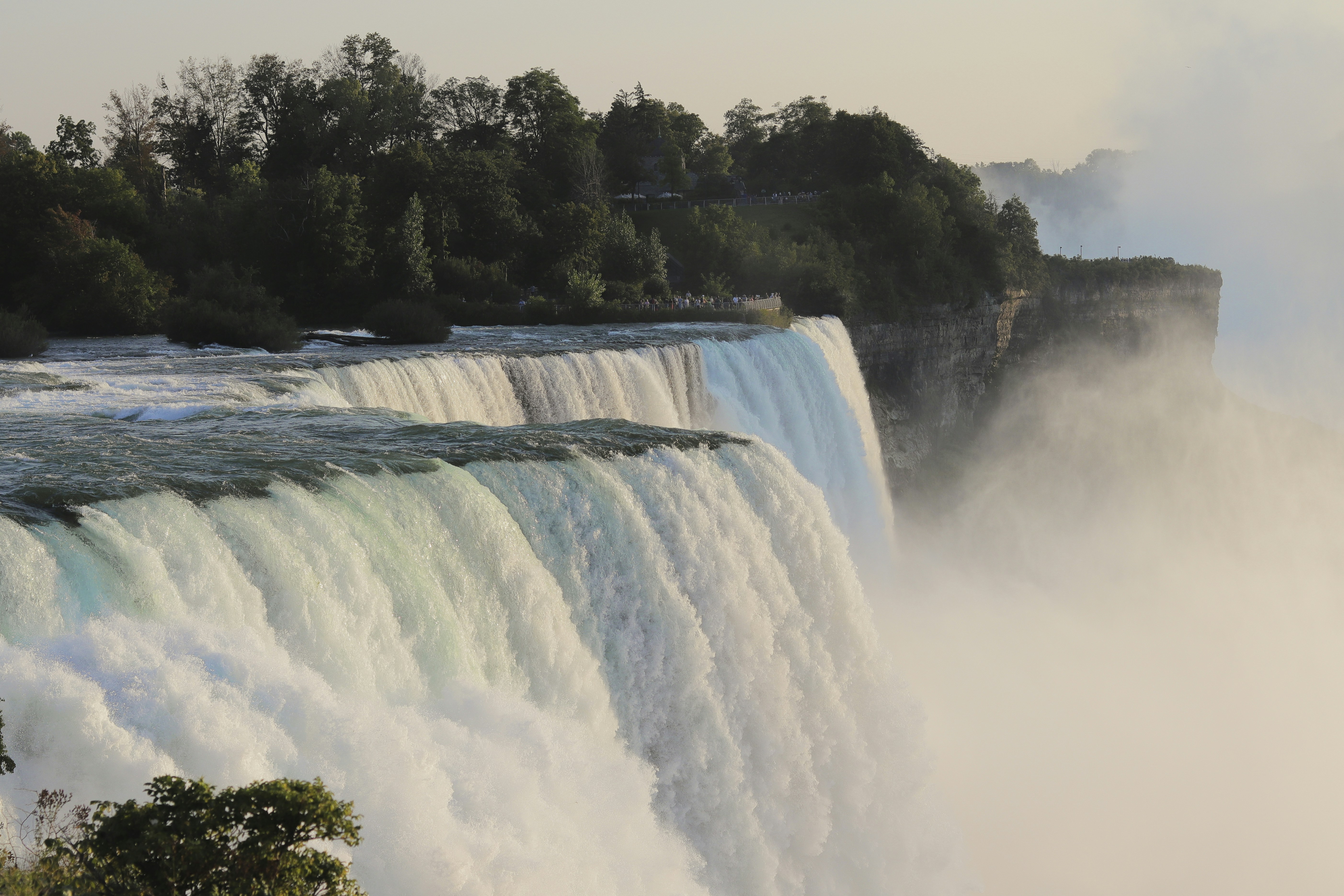 a large waterfall with water pouring out of it