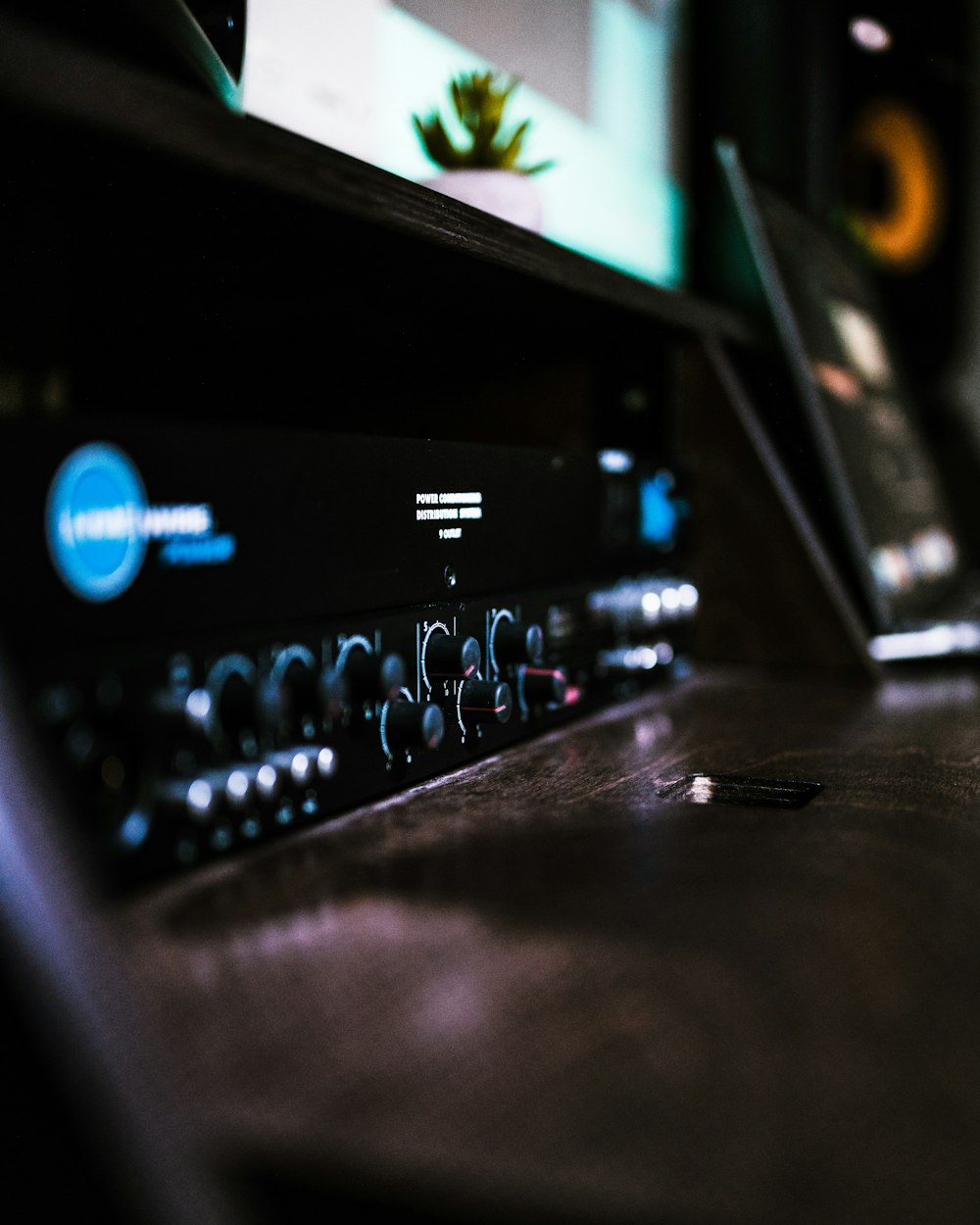 a close up of a sound board on a table