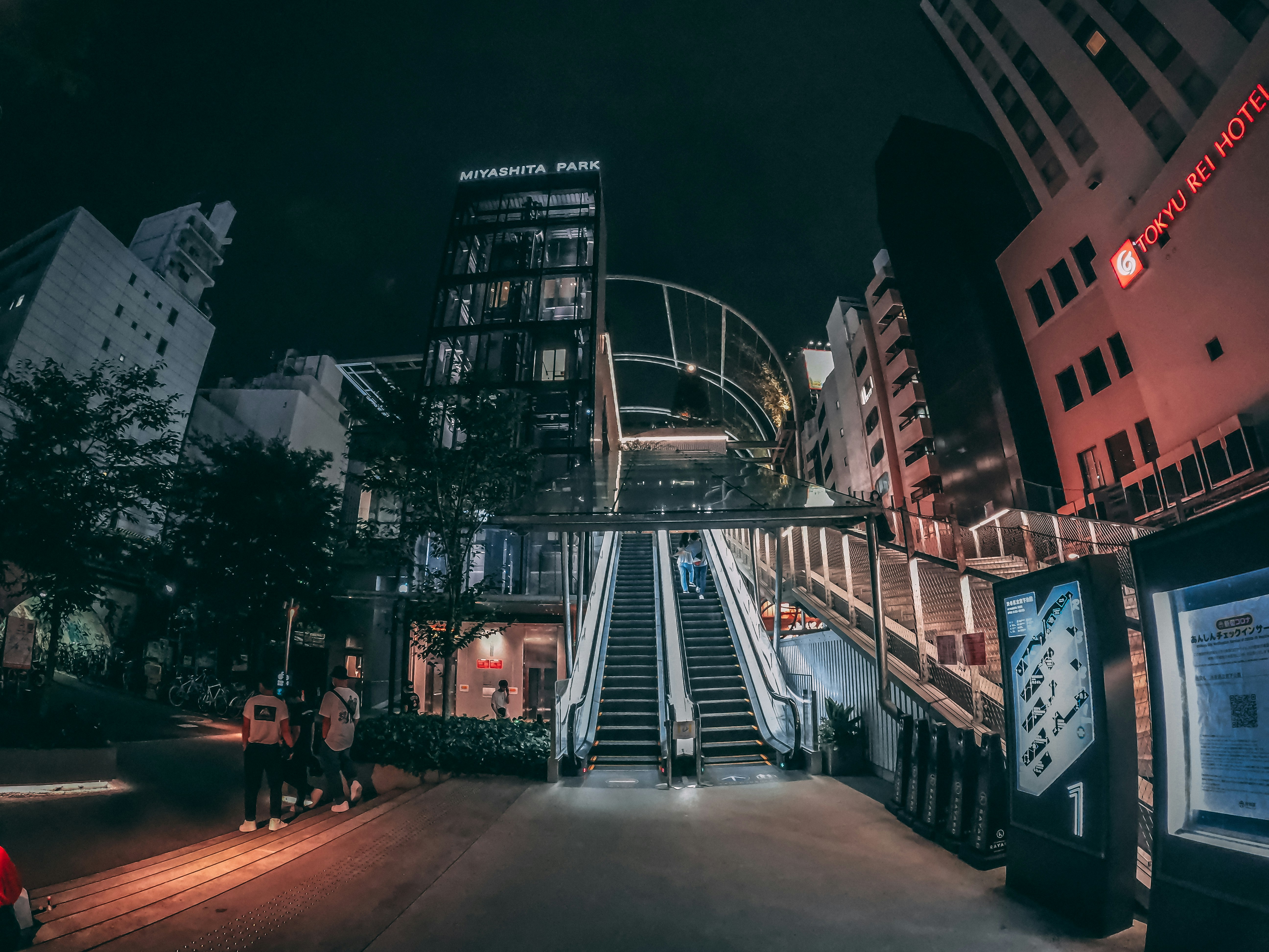 a group of people walking down a set of stairs