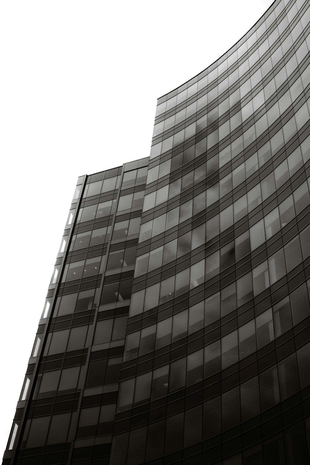 a black and white photo of a tall building