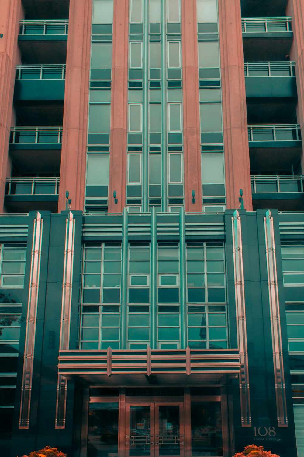 a tall building with a clock on the front of it