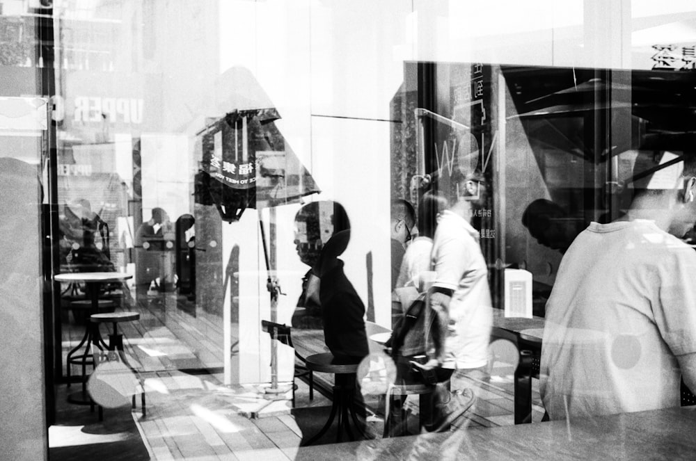 a group of people standing outside of a building