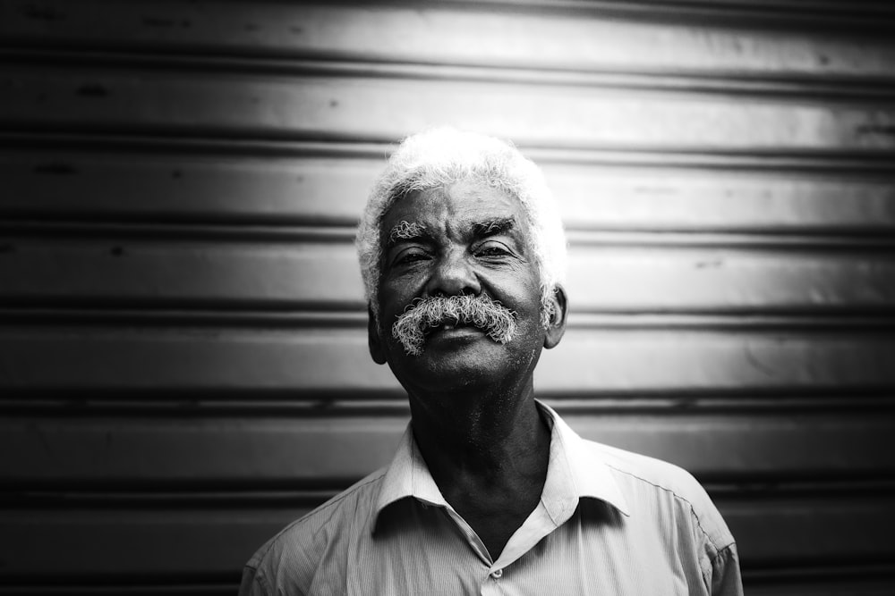 a black and white photo of an older man