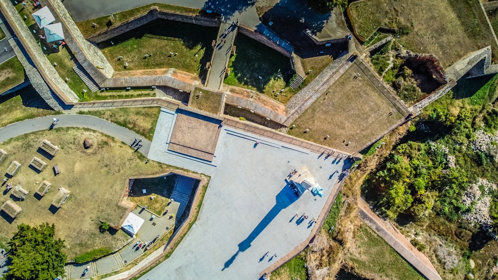 an aerial view of a park and a river