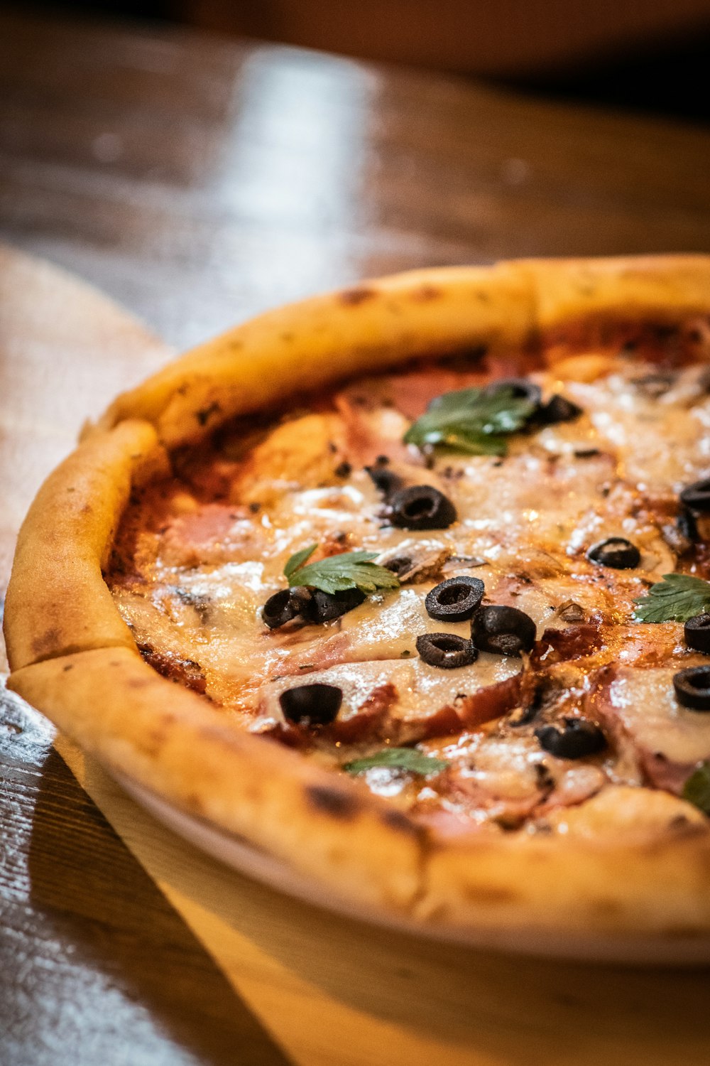 a close up of a pizza on a table