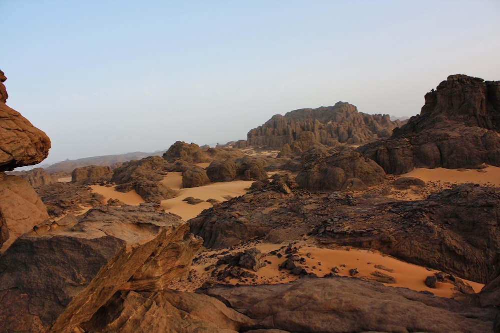 a rock formation in the middle of a desert